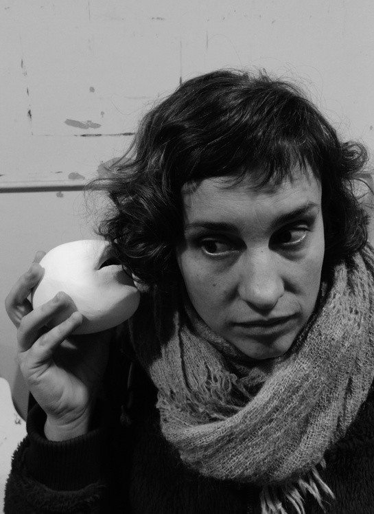 Black-and-white portrait of Morgan Vincent holding an egg